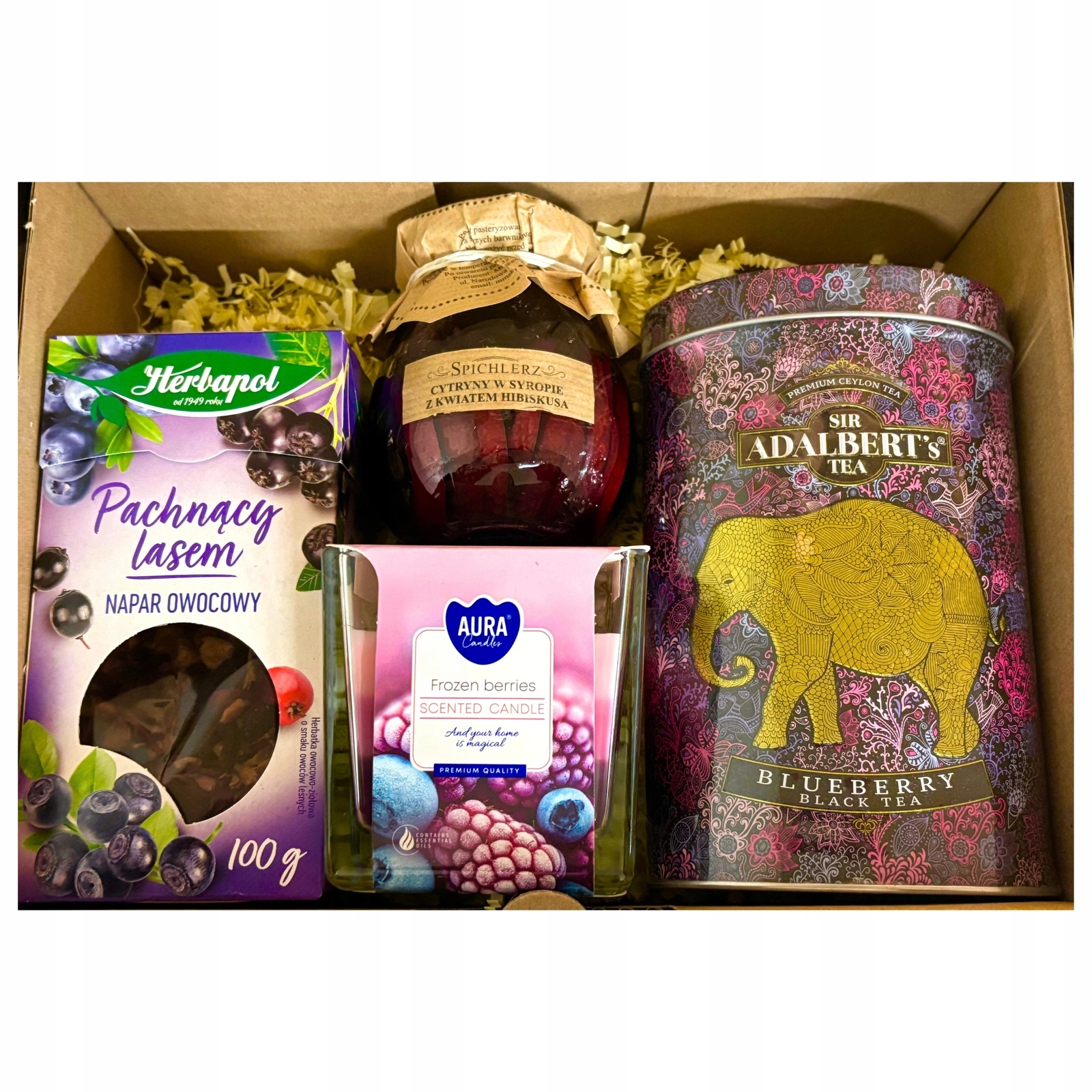 Zestaw prezentowy z herbatami, świeczką i cytrynami w syropie